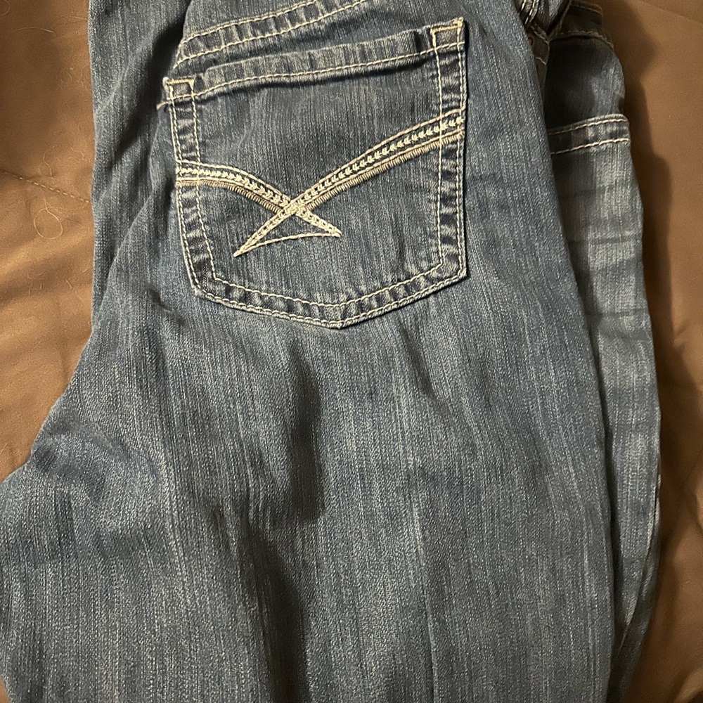 2 pairs of Cinch Emerson jeans. Size 32/13L